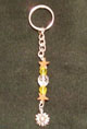 Marguerite daisy and gold star keychain